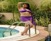 lakshmi rai sexy navel show legs show in purple bikini near swimming pool.jpg from lakshmi rai nud