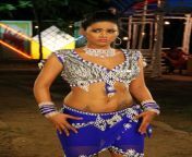 item girl mumaith khan hot navel show in arya surya movie photo gallery 3.jpg from surya madam sexy