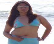 bulky tamil aunty in beach.jpg from tamil aunty bikini village bathing outdoors s