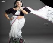 vishnu priya bhimeneni hot navel show in white saree.jpg from etv plus anchor vishnu priya sex