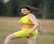 kajal agarwal legs show sizzling sleeveless yellow dress stills 28729.jpg from kajal out dress