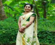 green blouse with kerala saree 282929.jpg from new karala