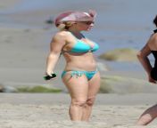 jenny mccarthy bikinis in malibu with her boyfriend and son 10.jpg from malibu ca actress jenny mccarthy and her long time boyfriend actor jim carrey spend the 4th of july with jennys son evan in their malibu home the couple looked happier than ever stealing kisses in between talking jenny spent great deal of time playing on the beach with evan building sandcastles and playing in the sand while jim watched on from their porch jim carrey was sporting peppered beard making him look older than usual which he didnt seem to mind gsi media july 2009 2a0cbkm jpg
