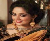 kavya madhavan double step jhumkas.jpg from south actress temple