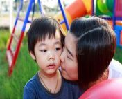 mom kissing boy playground 59910686.jpg from funny cute boy mom kiss