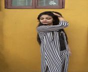 portrait indian bengali brunette girl striped semi formal wear enjoying herself rooftop happy mood back 171048229.jpg from indian desi gril 18 bangla dashi school sex with privet teachir video compopy mage sexy videoहि