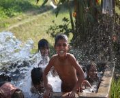children bathing tube well indian village jumping to water desperate bid to cool down heat used watering 57761129.jpg from nude village bath in tubewell