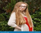 teen girl teenage w long blonde hair black glasses wearing red shirt cream sweater 61120675.jpg from girs w