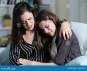 two sad friends sisters crying together home two sad friends sisters crying together couch living room 197473057.jpg from indian sister alone frice cry sex