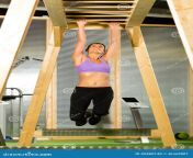woman hanging high horizontal bar training her arms 35460140.jpg from bars gir