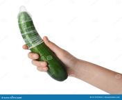 woman holding cucumber condom white background safe sex concept woman holding cucumber condom white background closeup 271379344.jpg from cocumder sex