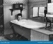 woman bathtub all persons depicted no longer living no estate exists supplier grants there will be no model 52005689.jpg from grant woman to bath of bay