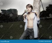 young teen removing his shirt 11096640.jpg from 16 old removing