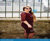 young chubby teenage girl wear red dress sunglasses posed against iron fence young chubby teenage girl 237162058.jpg from chubby teenage