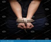 hands missing kidnapped abused hostage victim woman tied up rope emotional stress pain afraid restricted trapped 49838686.jpg from kidnapped tied up