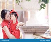 happy family young chinese mother has fun baby china traditional cheongsam carefree childhood parents cute pretty mom 96296654.jpg from china mom and son big boobs cook xxw
