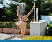 hot sexy female model posing shower outdoors fitness woman swimsuit taking douche summer vacations fashion bikini 190980763.jpg from sexy shower