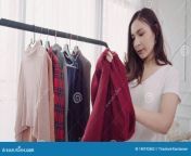 home wardrobe clothing shop changing room asian young woman choosing her fashion outfit clothes closet home store home 148192603.jpg from dress changing