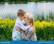 lovely mother kissing her son summer meadow 151318810.jpg from mom son kiswnloads