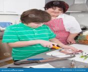 mother teaching her son to cook meat fat overweight fresh 35559452.jpg from big bbw mom son pg king vide