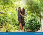 paare der liebe stehen bei sonnenuntergang im dschungel 143815195.jpg from desi outdoor jungle romance with lover