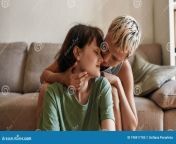 portrait young woman cuddling her girlfriend home lesbian couple spending time together indoors portrait young women 198417185.jpg from how lesbians spend time indoor 100 1634