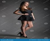 portrait young model woman black short skirt long legs full leght 47602924.jpg from long legs short skirt