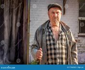 portrait elderly russian man village siberia russia august standing front old building 177660362.jpg from russian grandpa