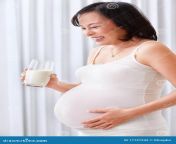 pregnant lady holding glass milk 17127242.jpg from sex preagnant milk asian tits drink black