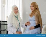 pregnant muslim women her muslim female doctor clinic gynaecology consultation pregnant muslim woman her muslim 163142449.jpg from muslim videoद