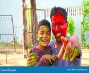 screaming portrait boy father face smeared colored powder rural village concept indian festival holi young 214389745.jpg from indian village virgin screaming and crying in painesi sex wep como