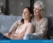 smiling millennial woman senior mother relax sofa home look distance dreaming imagining happy old mom adult grownup 227442634.jpg from dreaming bonita mom