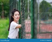 asian chinese college student enjoy free time campus freestyle carefree woman happiness active girl sweet smile teenager youth 103461147.jpg from chinese college students play wi