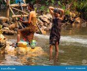 ban na laos april villagers having community bath together river deep counstryside laos community bath river 125318577.jpg from how to bath in village mp4