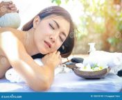beautiful asian woman doing spa sleeps staff uses herbal compress to massage her back teen girls massage spa 150678148.jpg from innocent first massage sex