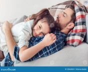 father little daughter home lying man sleeping girl looking camera smiling bearded men little girl home family time 133663834.jpg from dad in sleep daugther looking