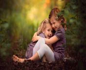 138299 little girl children hugging smiling depth of field.jpg from litle kids