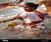 woman bathing in the ganges river at the third shahi snan kumbh mela d384xd.jpg from marathi village bathing