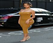 demi rose stuns in a mustard yellow strapless dress while out during london fashion week in london uk 150219 3.jpg from demi rose