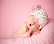 sleeping newborn baby girl wearing a crocheted hat on pink 157532446 1255x837 jpeg from desi cute bhabi rubi hot cam video collection 10 mp4
