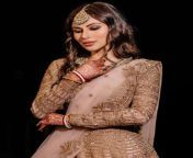 newly wed mouni roy looks exquisite in gold lehenga 1.jpg from mouni roy nude
