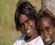 2 children looking at camera jpgrev2be977603cdb4a2e8f2d51817ee31076hashd5e9a2f1a9dc13143e563583615ec75a from aboriginal