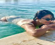 priyanka chopra always looks beautiful in any bikini she wears see her stunning swimsuit photos pool jpgfit8001000quality86stripall from piryanka copra sexy bikini