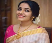 rajisha vijayan in saree cute smile pics.jpg from www tamil punndai