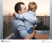 1670732 thirty year old father kisses his three year old son on the balcony photocase stock photo large jpeg from old father and daugh