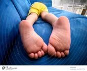 3621754 the soles of the feet of a child lying prone on a blue sofa dot photocase stock photo large jpeg from kids soles
