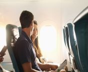 smiling couple sitting on airplane 700710935 5c2d3bab46e0fb000198f2ab.jpg from couple joins mile high club by having toilet snapchat sex mp4