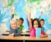 getty first grade class students raising hands smiling large christopher futcher 574b53845f9b5851654693f2.jpg from school and