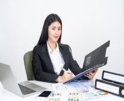 rsz lifestyle beautiful asian business young woman using laptop computer smart phone office desk.jpg from sekertaris