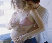 pregnant couple embracing high res stock photography 86071139 1555529680.jpg from pregnant six com